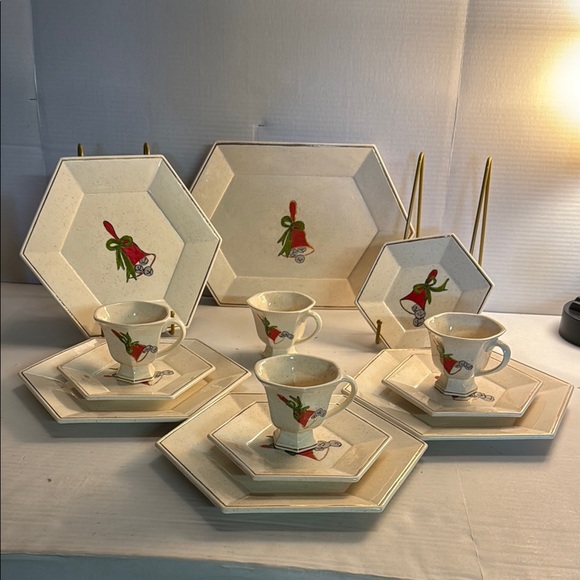 Elegant Cream Dinnerware Set with Red and Green Accents